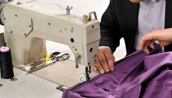 seamstress sewing machine clothing tailor